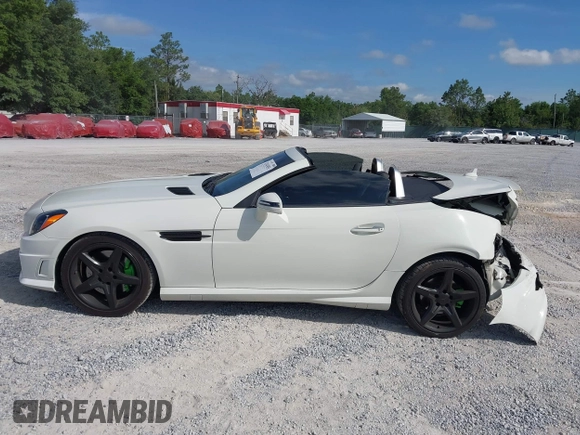 2013 Mercedes-Benz SLK 250 with VIN WDDPK4HA2DF056625, listed as a IAAI auction lot 42343051 with 96,615 mi miles and . Bid and sale history available at DreamBid. Image 14.
