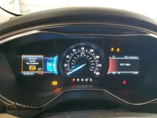 2015 Ford Fusion SE z VIN 3FA6P0HD3FR109984, wystawiony jako Copart lot #59847705 z przebiegiem 152 480 mil mil oraz Szkoda całkowita • Salvage title. Historia ofert i sprzedaży dostępna na DreamBid. Obrazek 9.