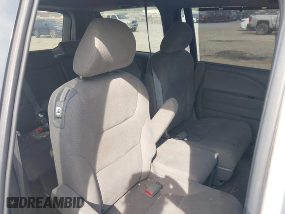 2010 Honda Odyssey EX with VIN 5FNRL3H43AB025629, listed as a IAAI auction lot 42095744 with 209,722 mi miles and . Bid and sale history available at DreamBid. Image 8.