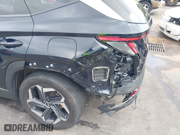 2022 Hyundai Tucson SEL Convenience with VIN KM8JFCA10NU049450, listed as a IAAI auction lot 41915300 with 23,584 mi miles and . Bid and sale history available at carsss.com. Image 6.