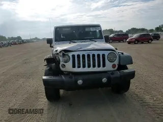 2012 Jeep Wrangler Sport with VIN 1C4AJWAGXCL133013, listed as a Copart auction lot 59788325 with 141,015 mi miles and Clean title. Bid and sale history available at DreamBid. Image 15.