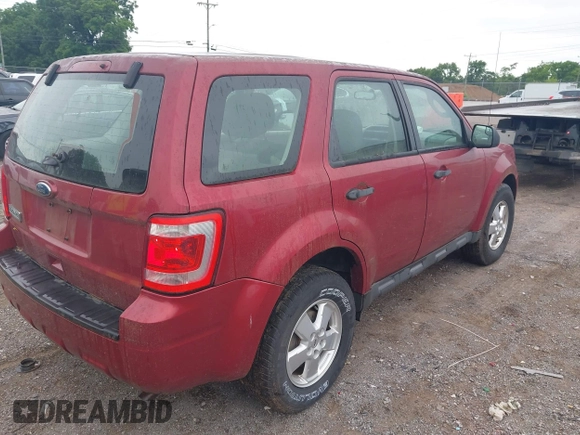 2012 Ford Escape XLS z VIN 1FMCU9C75CKB34585, wystawiony jako IAAI lot #42472033 z przebiegiem 184 695 mil mil oraz . Historia ofert i sprzedaży dostępna na DreamBid. Obrazek 4.