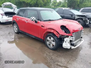 2017 MINI Hardtop 4 Door Cooper with VIN WMWXU1C58H2E18094, listed as a IAAI auction lot 42312473 with 50,482 mi miles and . Bid and sale history available at DreamBid. Image 1.