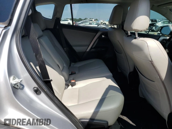 2018 Toyota RAV4 XLE with VIN 2T3WFREVXJW427748, listed as a Copart auction lot 61833055 with 104,057 mi miles and Salvage title. Bid and sale history available at DreamBid. Image 11.