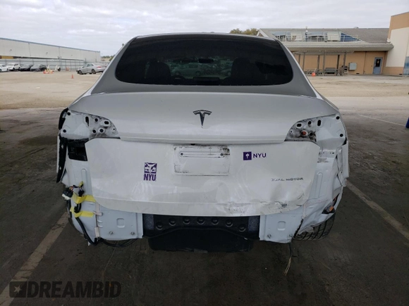 2022 Tesla Model Y Long Range z VIN 7SAYGDEE4NF576275, wystawiony jako Copart lot #53968925 z przebiegiem 30 524 mil mil oraz Szkoda całkowita • Salvage title. Historia ofert i sprzedaży dostępna na DreamBid. Obrazek 6.