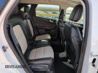 2021 Ford Escape Titanium Hybrid z VIN 1FMCU0DZ2MUB02954, wystawiony jako Copart lot #50558285 z przebiegiem 25 612 mil mil oraz Szkoda całkowita • Salvage title. Historia ofert i sprzedaży dostępna na DreamBid. Obrazek 10.