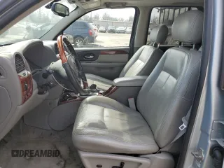 2008 GMC Envoy Denali with VIN 1GKES63M482205987, listed as a Copart auction lot 49376735 with 141,732 mi miles and Salvage Title. Bid and sale history available at carsss.com. Image 7.