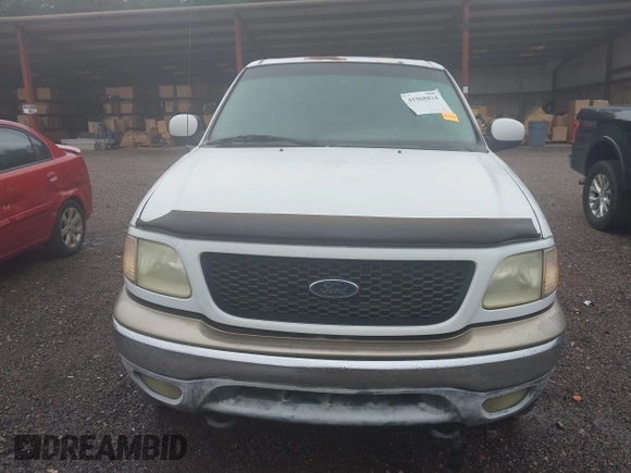 2002 Ford F-150 XLT with VIN 1FTRW08L92KB32427, listed as a IAAI auction lot 41968814 with 325,372 mi miles. Bid and sale history available at carsss.com. Image 6.