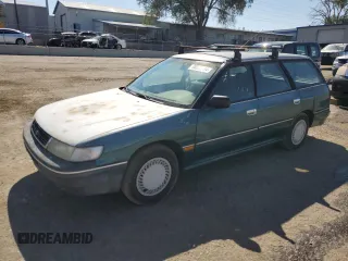 1994 Subaru Legacy L with VIN 4S3BJ6337R7955431, listed as a Copart auction lot 70200794 with 281,694 mi miles and Salvage Title. Bid and sale history available at DreamBid. Image 1.