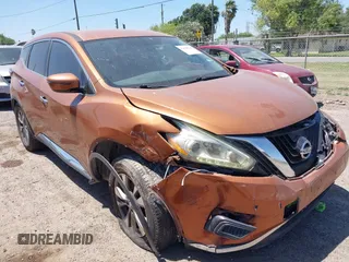 2016 Nissan Murano Platinum z VIN 5N1AZ2MG6GN129205, wystawiony jako IAAI lot #42030040 z przebiegiem 153 712 mil mil oraz . Historia ofert i sprzedaży dostępna na DreamBid. Obrazek 1.