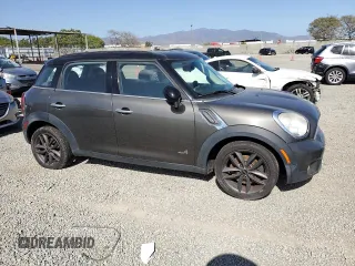 2011 MINI Countryman S with VIN WMWZC5C54BWL52742, listed as a Copart auction lot 54376635 with 124,887 mi miles and Clean Title. Bid and sale history available at DreamBid. Image 4.