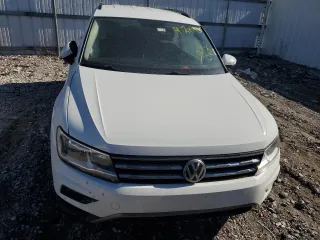 2018 Volkswagen Tiguan SEL z VIN 3VV3B7AX5JM086823, wystawiony jako Copart lot #48991035 z przebiegiem Nie podano mil oraz Szkoda całkowita • Salvage title. Historia ofert i sprzedaży dostępna na DreamBid. Obrazek 5.