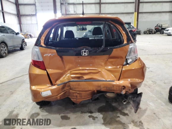 2009 Honda Fit Sport z VIN JHMGE88439S058349, wystawiony jako Copart lot #56873185 z przebiegiem 117 523 mil mil oraz Szkoda całkowita • Salvage title. Historia ofert i sprzedaży dostępna na DreamBid. Obrazek 6.