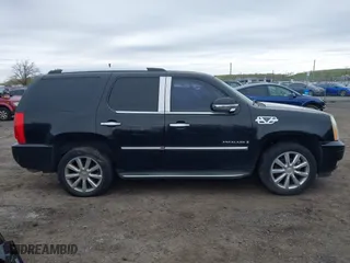 2009 Cadillac Escalade with VIN 1GYFK23219R102455, listed as a IAAI auction lot 42094042 with 238,407 mi miles. Bid and sale history available at carsss.com. Image 14.