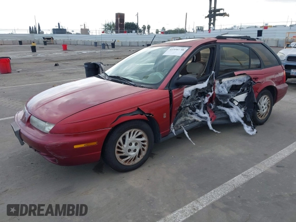 1999 Saturn SW z VIN 1G8ZK8276XZ333989, wystawiony jako IAAI lot #41550338 z przebiegiem 142 592 mil mil oraz . Historia ofert i sprzedaży dostępna na DreamBid. Obrazek 18.