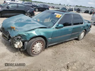 1992 Honda Accord with VIN 1HGCB7578NA180742, listed as a Copart auction lot 52912285 with 336,231 mi miles and Salvage title. Bid and sale history available at DreamBid. Image 1.
