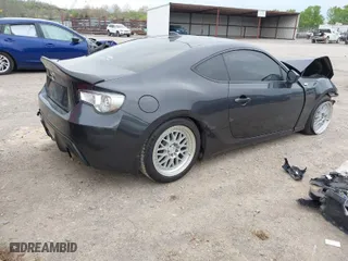 2015 Scion FR-S with VIN JF1ZNAA10F9701637, listed as a IAAI auction lot 41912045 with 1 mi miles. Bid and sale history available at carsss.com. Image 4.