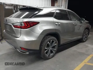2022 Lexus RX 350 z VIN 2T2HZMDA9NC366292, wystawiony jako IAAI lot #42381449 z przebiegiem 26 717 mil mil oraz . Historia ofert i sprzedaży dostępna na DreamBid. Obrazek 4.