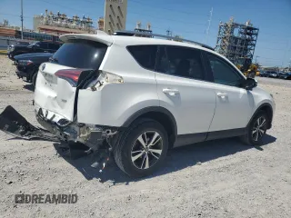 2018 Toyota RAV4 XLE with VIN 2T3WFREV7JW512949, listed as a Copart auction lot 52546345 with 41,558 mi miles and Salvage Title. Bid and sale history available at DreamBid. Image 3.