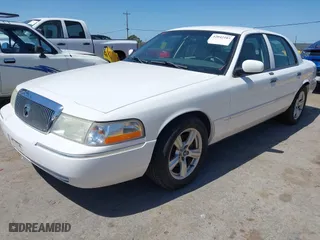 2005 Mercury Grand Marquis LS Premium with VIN 2MEFM75W15X631500, listed as a IAAI auction lot 42042103 with 164,810 mi miles. Bid and sale history available at carsss.com. Image 2.