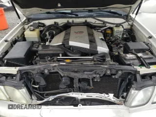 2004 Lexus LX 470 with VIN JTJHT00W343547828, listed as a Copart auction lot 48982045 with 196,877 mi miles and Salvage Title. Bid and sale history available at DreamBid. Image 12.