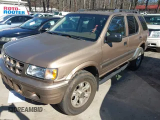 2001 Isuzu Rodeo S with VIN 4S2CK58W414322118, listed as a IAAI auction lot 41496624 with 244,189 mi miles and . Bid and sale history available at DreamBid. Image 2.