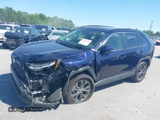 2023 Toyota RAV4 Hybrid XLE Premium with VIN JTMB6RFV4PD098886, listed as a IAAI auction lot 42112706 with 47,743 mi miles and . Bid and sale history available at DreamBid. Image 2.