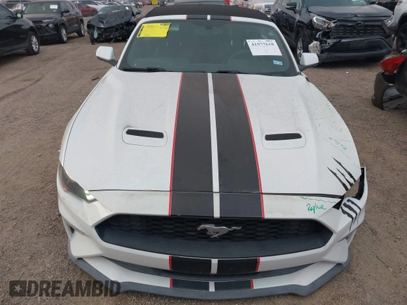 2020 Ford Mustang EcoBoost z VIN 1FATP8UH4L5120002, wystawiony jako IAAI lot #41977618 z przebiegiem 63 570 mil mil oraz . Historia ofert i sprzedaży dostępna na DreamBid. Obrazek 13.