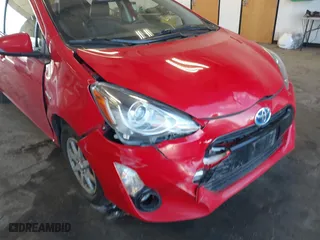 2015 Toyota Prius c One with VIN JTDKDTB3XF1108456, listed as a IAAI auction lot 41743379 with 132,265 mi miles. Bid and sale history available at carsss.com. Image 6.