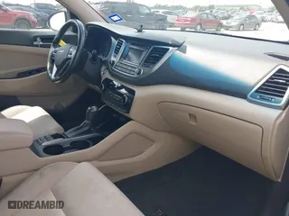 2017 Hyundai Tucson Value with VIN KM8J33A27HU430198, listed as a IAAI auction lot 42104369 with 163,929 mi miles. Bid and sale history available at carsss.com. Image 5.