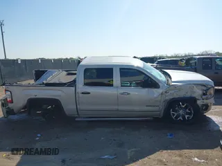 2014 GMC Sierra 1500 SLT with VIN 3GTP1VEC5EG486951, listed as a IAAI auction lot 41939376 with 131,857 mi miles and . Bid and sale history available at DreamBid. Image 13.