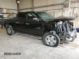2010 Chevrolet Silverado 1500 LT with VIN 3GCRCSE04AG222542, listed as a Copart auction lot 54663205 with 157,358 mi miles and Salvage Title. Bid and sale history available at DreamBid. Image 4.