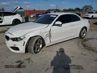 2016 BMW 4 Series 428i with VIN WBA3V7C57G5A27594, listed as a Copart auction lot 87968815 with 55,058 mi miles and Salvage Title. Bid and sale history available at carsss.com. Image 1.