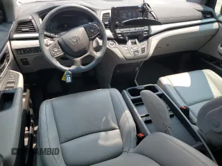 2023 Honda Odyssey EX-L z VIN 5FNRL6H6XPB064259, wystawiony jako Copart lot #58986395 z przebiegiem 22 137 mil mil oraz Szkoda całkowita • Salvage title. Historia ofert i sprzedaży dostępna na DreamBid. Obrazek 8.