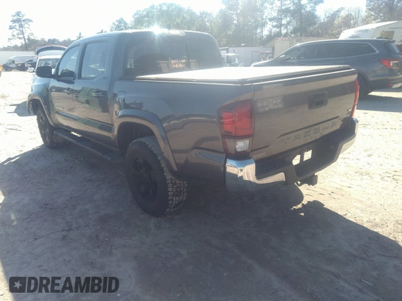 2018 Toyota Tacoma SR5 with VIN 5TFAZ5CN0JX056706, listed as a IAAI auction lot 41774141 with 31,738 mi miles and . Bid and sale history available at DreamBid. Image 3.