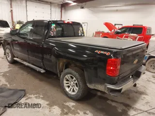 2016 Chevrolet Silverado 1500 LT with VIN 1GCVKREC5GZ176474, listed as a IAAI auction lot 41983780 with 118,587 mi miles and . Bid and sale history available at DreamBid. Image 3.
