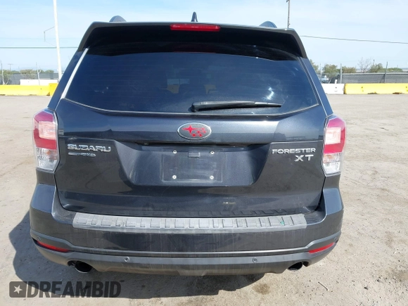 2018 Subaru Forester Touring with VIN JF2SJGWCXJH601162, listed as a IAAI auction lot 41760750 with 69,655 mi miles. Bid and sale history available at carsss.com. Image 16.