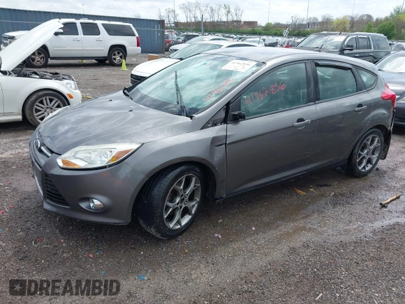 2014 Ford Focus SE with VIN 1FADP3K28EL337377, listed as a IAAI auction lot 41962856 with 137,906 mi miles. Bid and sale history available at carsss.com. Image 2.