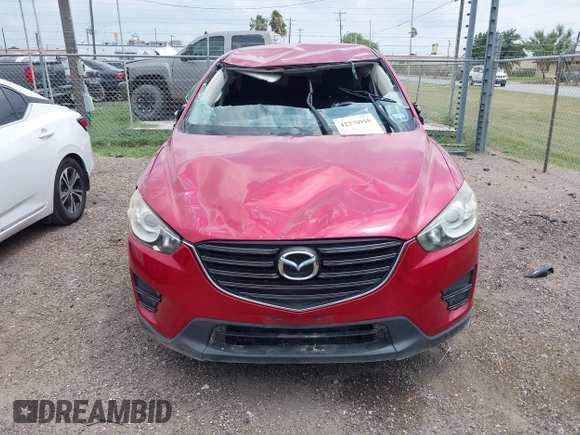2016 Mazda CX-5 Sport with VIN JM3KE2BYXG0668401, listed as a IAAI auction lot 42370910 with Not provided miles and . Bid and sale history available at DreamBid. Image 6.