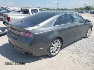 2015 Lincoln MKZ with VIN 3LN6L2G95FR620154, listed as a IAAI auction lot 42257441 with 89,022 mi miles and . Bid and sale history available at DreamBid. Image 4.