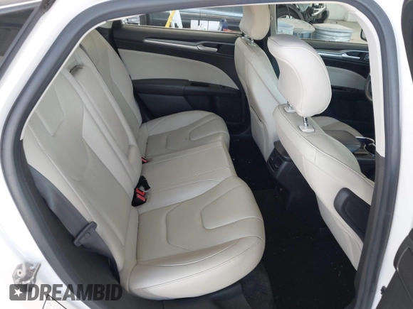 2016 Ford Fusion Titanium with VIN 3FA6P0K96GR390989, listed as a IAAI auction lot 42634275 with 123,559 mi miles and . Bid and sale history available at DreamBid. Image 8.