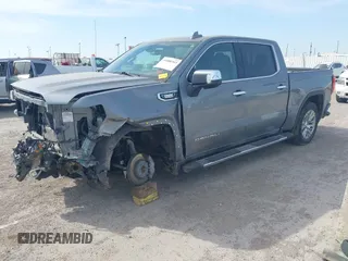 2021 GMC Sierra 1500 Denali z VIN 3GTU9FETXMG382438, wystawiony jako IAAI lot #41880365 z przebiegiem 54 651 mil mil oraz . Historia ofert i sprzedaży dostępna na DreamBid. Obrazek 19.