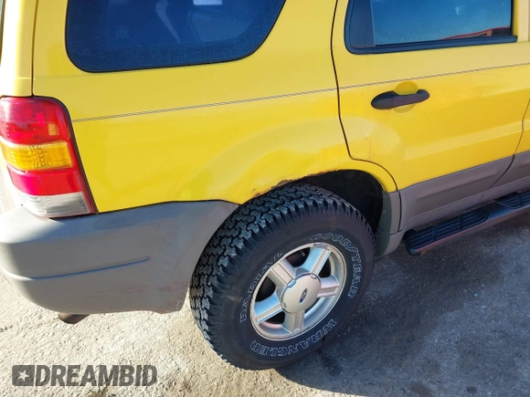 2001 Ford Escape XLS with VIN 1FMYU02191KF55561, listed as a IAAI auction lot 41650852 with 234,247 mi miles. Bid and sale history available at carsss.com. Image 6.
