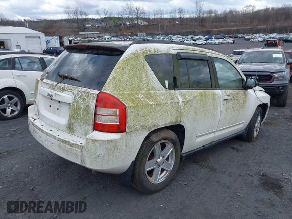 2010 Jeep Compass Sport with VIN 1J4NF4FB3AD510495, listed as a IAAI auction lot 41841332 with 148,681 mi miles. Bid and sale history available at carsss.com. Image 4.