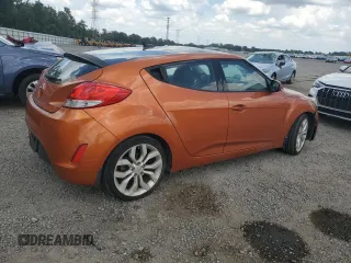 2013 Hyundai Veloster w/Red Int with VIN KMHTC6AD5DU094010, listed as a Copart auction lot 58048795 with 90,455 mi miles and Salvage title. Bid and sale history available at DreamBid. Image 3.