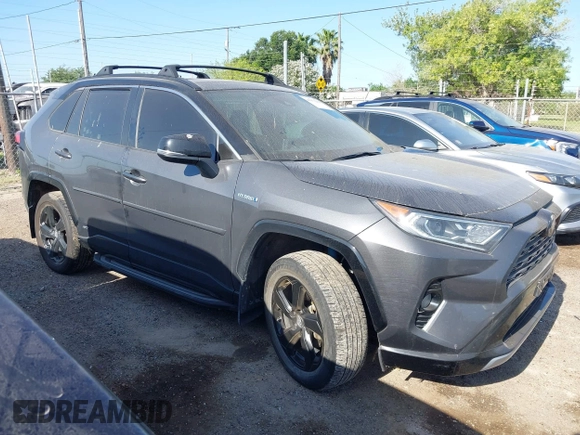 2021 Toyota RAV4 Hybrid XSE z VIN 2T3E6RFV8MW006805, wystawiony jako IAAI lot #41973250 z przebiegiem 77 483 mil mil oraz . Historia ofert i sprzedaży dostępna na DreamBid. Obrazek 13.