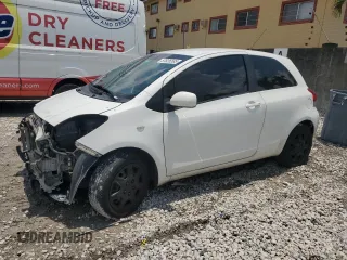 2010 Toyota Yaris z VIN JTDJT4K35A5322468, wystawiony jako Copart lot #57826585 z przebiegiem 169 167 mil mil oraz Szkoda całkowita • Salvage title. Historia ofert i sprzedaży dostępna na DreamBid. Obrazek 1.