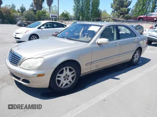 2003 Mercedes-Benz S-Class 4.3L with VIN WDBNG70J73A377067, listed as a IAAI auction lot 42137032 with 122,938 mi miles. Bid and sale history available at carsss.com. Image 2.