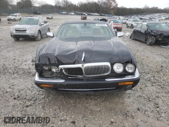 2003 Jaguar XJ Vanden Plas with VIN SAJDA24C33LF52131, listed as a Copart auction lot 84263554 with Not provided miles and Clean title. Bid and sale history available at DreamBid. Image 5.