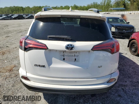 2016 Toyota RAV4 LE with VIN 2T3ZFREV8GW310210, listed as a Copart auction lot 52566305 with 56,354 mi miles and Salvage Title. Bid and sale history available at DreamBid. Image 6.